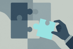 Hand places final puzzling piece