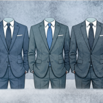 Three empty suits standing side-by-side